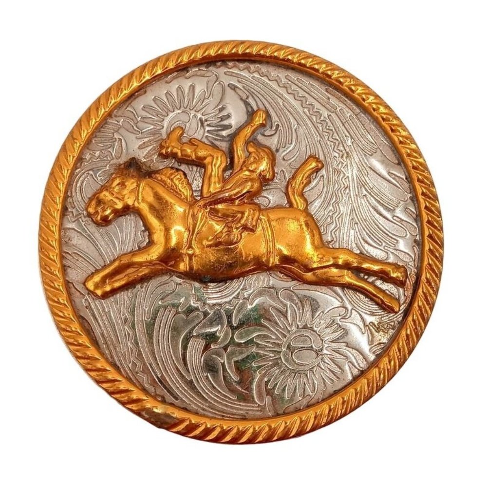 Vintage cowboy and bucking bronco belt buckle. A few